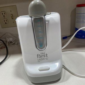 The first years 2- in - 1 simple serve bottle warmer